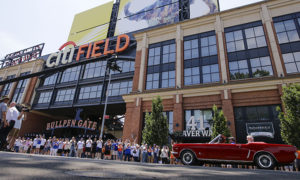Fans gather near Citi Field to honor the 1969 New York Mets before a baseball game against the Atlanta Braves Saturday, June 29, 2019, in New York. (AP Photo/Frank Franklin II)