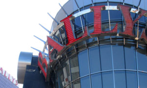 This Oct. 1, 2020 photo shows the exterior of Bally's casino in Atlantic City, N.J. The new owners of Bally's Atlantic City are attempting to revive a comatose casino in perhaps the most cutthroat gambling market in America. Rhode Island-based Bally's Corporation is spending at least $90 million on the Boardwalk casino over the next five years, including hotel room makeovers, a renovation of the casino floor, new slot machines and restaurants, and more live entertainment. (AP Photo/Wayne Parry)