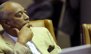 Assemblyman Gary Pretlow, D-Mount Vernon, listens to Assembly members debate the interactive fantasy sports contest legislative bill in the Assembly Chamber at the Capitol on Friday, June 17, 2016, in Albany, N.Y. (AP Photo/Hans Pennink)