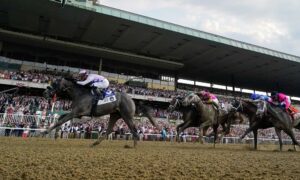 arcangelo crosses finish line 2023 belmont stakes