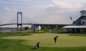 practice green at trump links with whitestone bridge in background