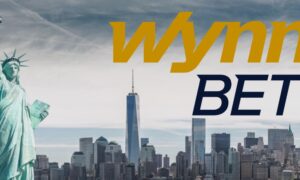 wynnbet logo over new york city skyline with statue of liberty