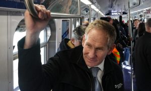 mta ceo john lieber, seen here riding the rails, reportedly has financial ties to a downstate new york casino bid