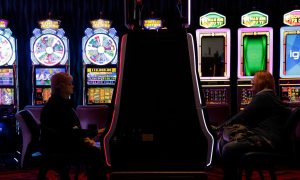 customers play slots at resorts world catskills, which helped commercial casinos in new york post nearly $60 million in september
