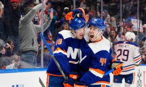 new york islanders players celebrate a goal for a story on december 2023 new york sports betting revenue