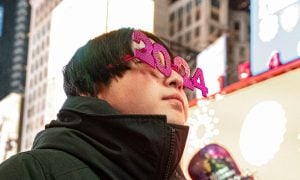 person celebrates 2024 new year in new york for a story on a lookahead to what we can expect for new york gambling in 2024