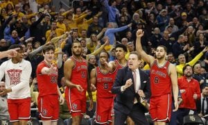 Photo of St. John's basketball team and Rick Pitino for story on NY having its best-ever sports betting handle month in February