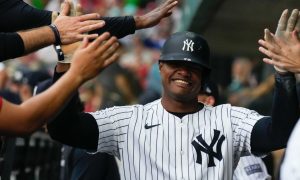 New York Yankees Oscar Gonzalez celebrates for a story on New York sports betting revenue for March 2024