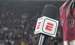 Image of a microphone with the ESPN logo for a story on executives targeting a New York launch of ESPN Bet sportsbook by the 2024 NFL season.