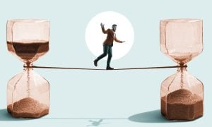 Image of a man tightrope walking between hourglasses for a story on the Gaming Facility Location Board setting a June 2025 deadline for downstate New York casino applications.
