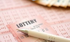 Image of a lottery ticket for a story on theLotter launching a New York lottery courier service.