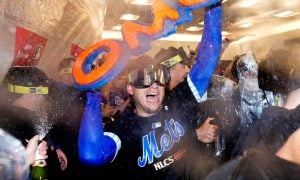 New York Mets celebrate beating Philadelphia Phillies to reach NLCS.