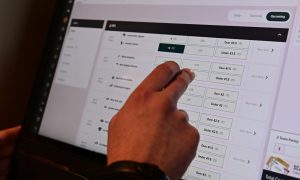 Customer places a bet at Caesars Sportsbook in Cleveland.